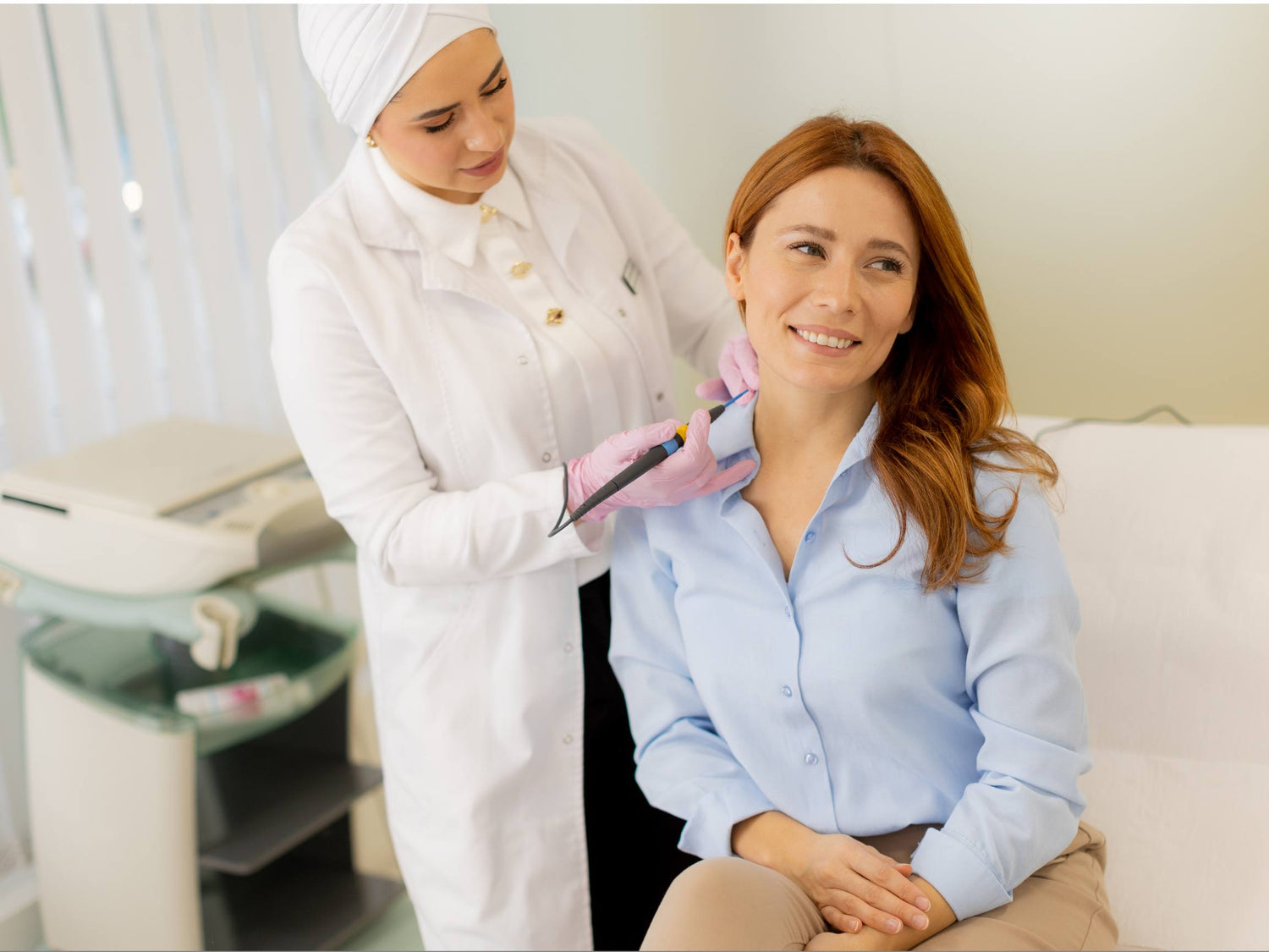 Woman receiving evenskyn anti-aging treatment